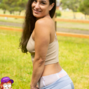 While wearing a pull-on diaper under her leggings, Gabriella poses for the camera.