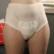 Close-up shot of Sosha peeing in her diaper.