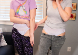 Sosha and Alisha pull down their pants, showing off their diapers to the camera.